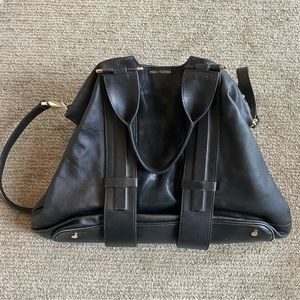Pour La Victoria black leather bag